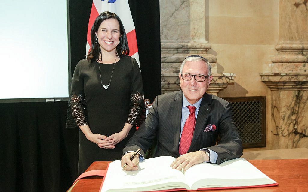 Montreal mayor Valerie Plante, left, with the president of Congregation Shearith Israel, Edmond Elbaz at a March 20, 2018 ceremony at Montreal City Hall. (Sylvain Légaré)