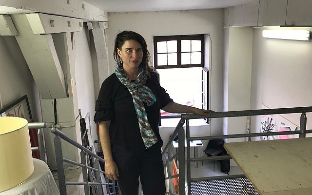 Shiry Avny in her art studio overlooking the Canal de l’Ourcq. (Robert Sarner/ Times of Israel)