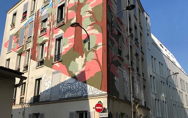 Close-up of a wall mural on the Rue du Retrait shown on an Arternative tour. (Robert Sarner/ Times of Israel)