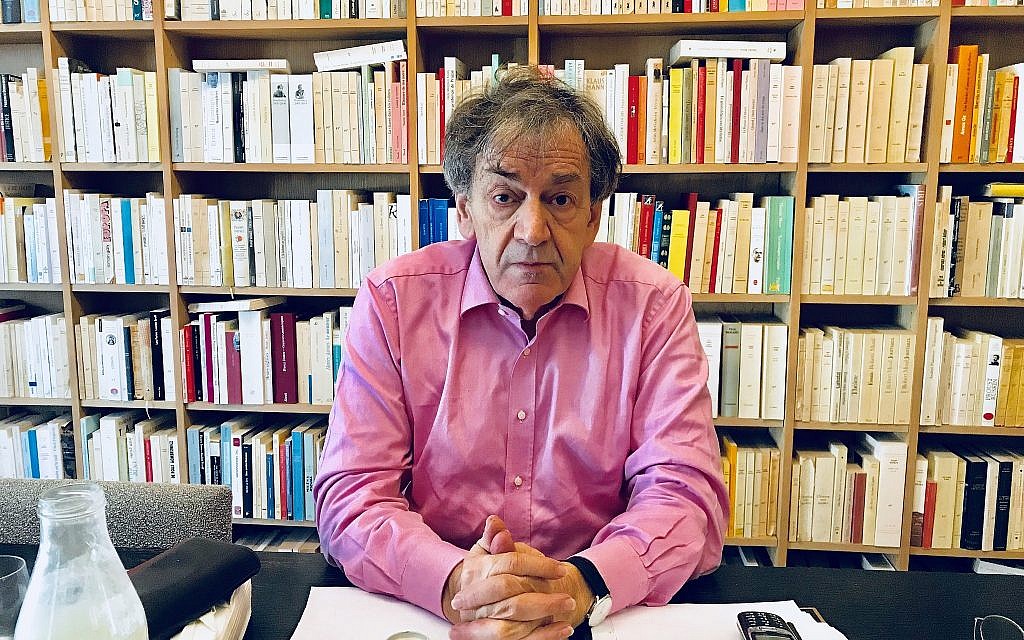 Alain Finkielkraut in his Paris home (Robert Sarner/Times of Israel)