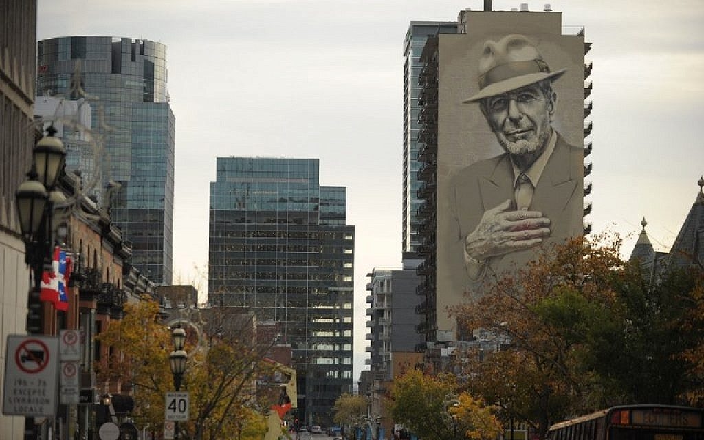 A mural of musician Leonard Cohen seen on a building in downtown Montreal, November 7, 2017. (AFP/Marc Braibant)