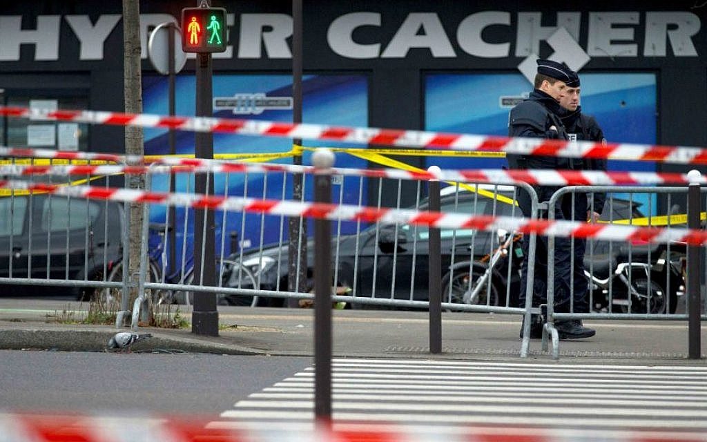 Illustrative: Two French security officers standing guard on Saturday, January 10, 2015, the day after a terror attack on a kosher market in Paris. (photo credit: AP Photo/Peter Dejong)