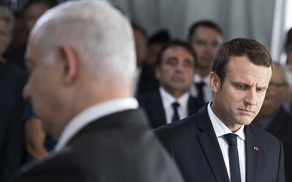 Israeli Prime Minister Benjamin Netanyahu, left, and French President Emmanuel Macron attend a ceremony commemorating the 75nd anniversary of the Vel d’Hiv roundup, Sunday, July 16, 2017 in Paris. (AP Photo/Kamil Zihnioglu, Pool)
