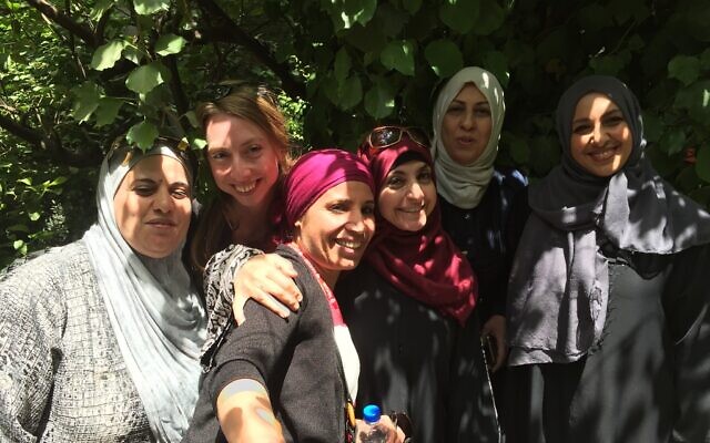 Amal Elsana-Alh’jooj, center-left, with women volunteers at the Waqe3 community center in Jordan.