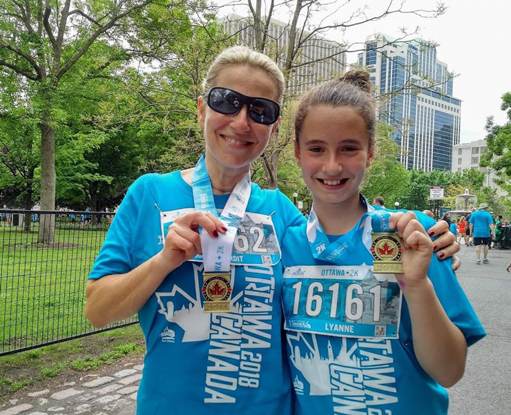 PHOTO - Vardit with daughter, Lyanne, after running in Ottawa Marathon in May 2019