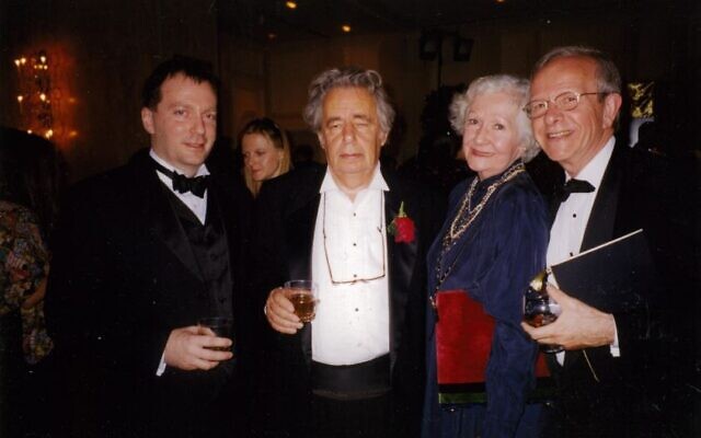 Canadian author Mordecai Richler, center, with his family and with agent Michael Levine, right, in this undated photo.