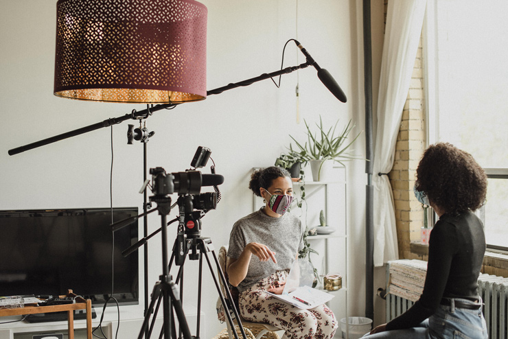 Director Sara Yacobi-Harris interviews Sarah Aklilu during filming of 'Periphery,' part of the exhibition of the same name at UJA Toronto. (Liat Aharoni)