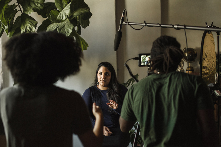 Ariella Daniels being interviewed during filming of ‘Periphery,’ part of the exhibition of the same name at UJA Toronto. (Liat Aharoni)