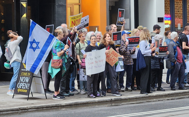 Small group of demonstrators rallying against Prime Minister Benjamin Netanyahu outside the Toronto screening of ‘The Bibi Files,’ September 9, 2024. (Albert Elbaz)