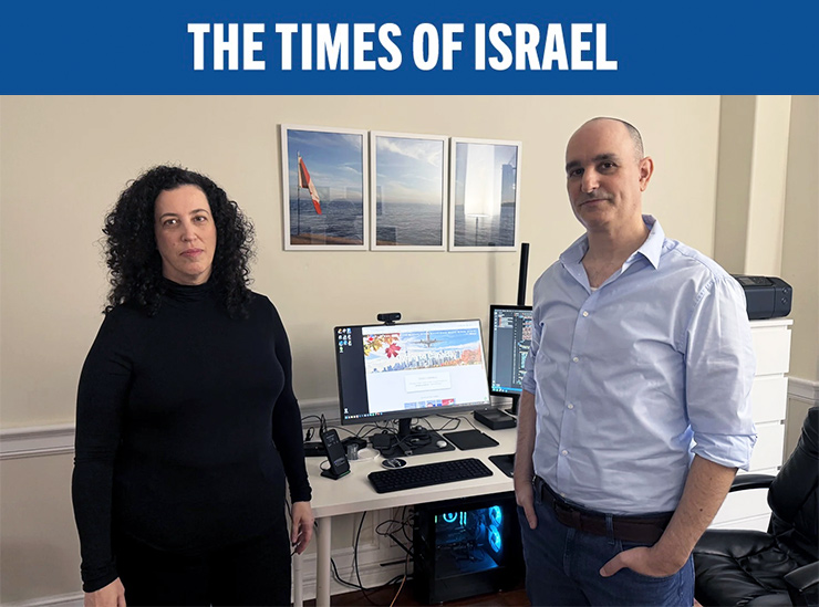 Michal Harel and her husband Avital Epstein show the website they set up to help Israelis navigate a move to Canada in Oakville, Ontario, Canada, December 4, 2024. (AP Photo/Rob Gillies)