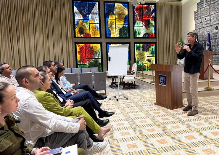 At Presidential Residence in Jerusalem, Glenn Cohen gives President Isaac Herzog and his staff his lecture 'From Captivity to Resilience,' focusing on lessons in resilience from the 147 hostages released until then, April 2025. (Photo courtesy of G. Cohen)